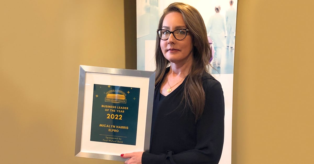 Micalyn Harris proudly accepts the Business Leader of the Year 2022 Award.